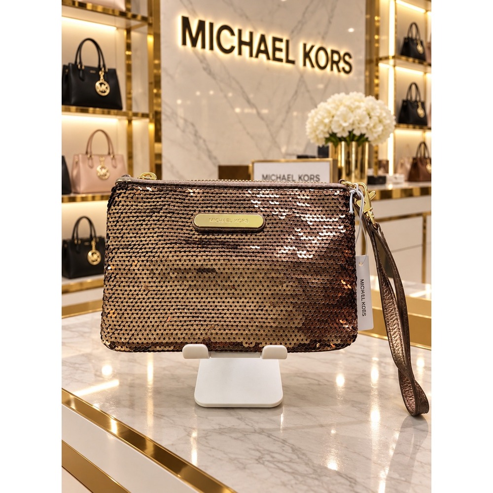 W275 Michael Kors Sequin wristlet
